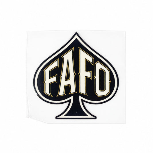 FAFO spade UV decal in black with bone-colored letters and fine gold accents.