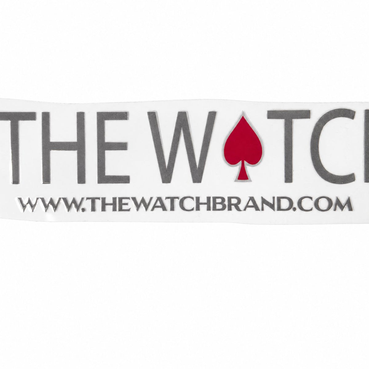 Detail photo of the large gray and red The Watch signature UV decal; the outer edges are outside the photograph.