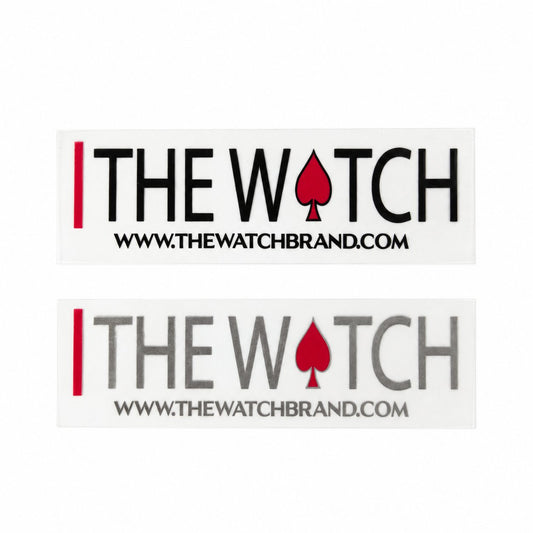 The Watch signature UV decals in black/red and gray/red, with the website beneath the wordmark.