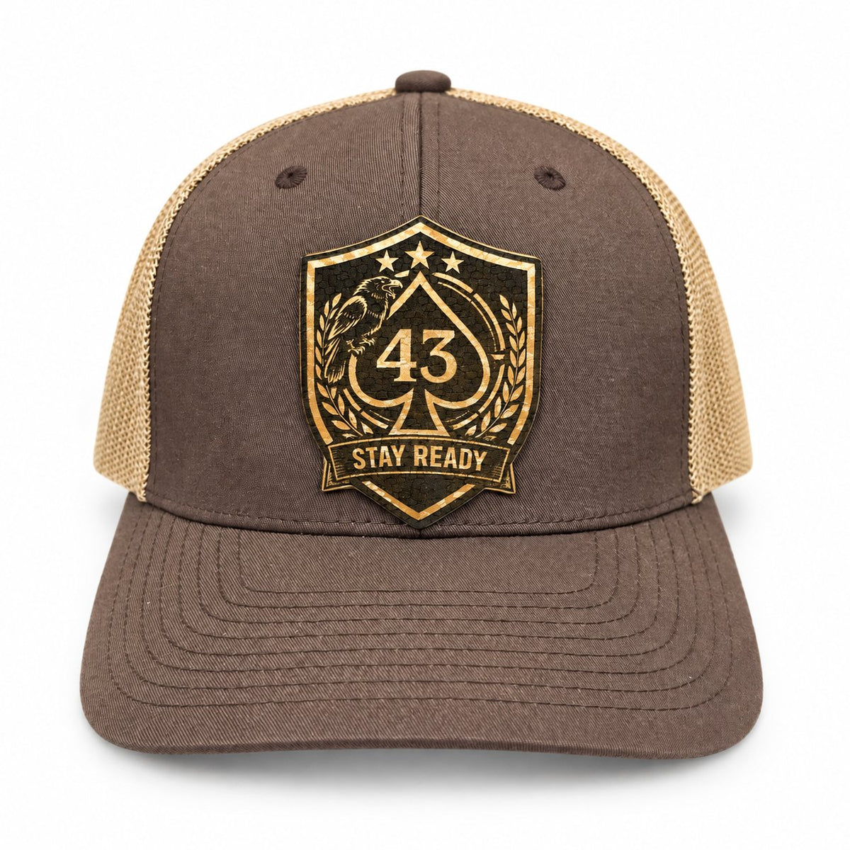 Brown and tan Richardson 112 trucker hat with a black and gold Stay Ready logo patch.