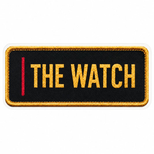 The Watch name tag UV decal with a printed gold embroidery effect on black and a red pillar.